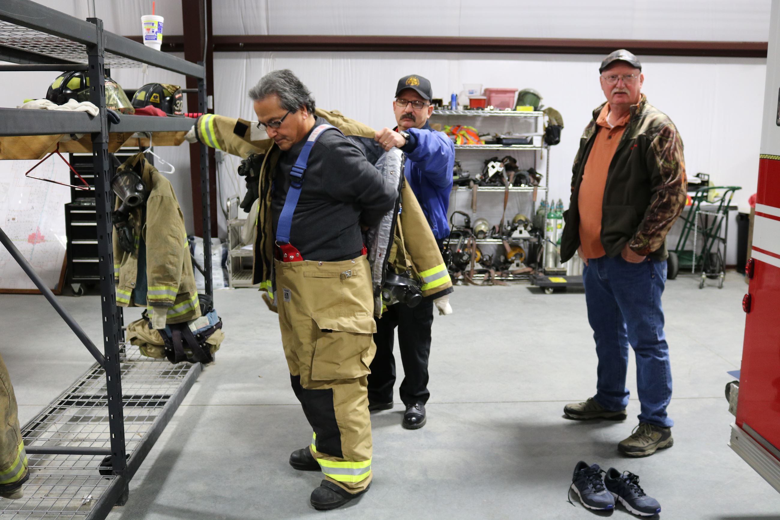 Louis Ysusi trying on Firefighter Gear